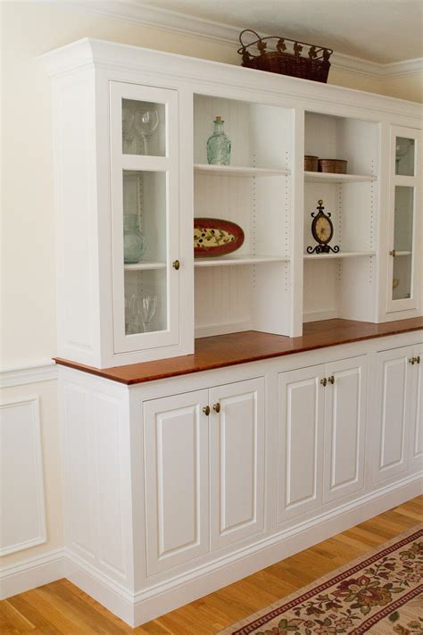 cabinet that stores dining table.